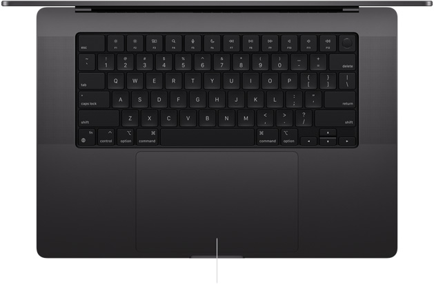 Top-down view of open MacBook Pro 16-inch showing Force Touch trackpad located below keyboard