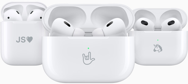 Three AirPods Charging Cases are engraved with example emojis: initials, an I-love-you hand sign, and a unicorn.