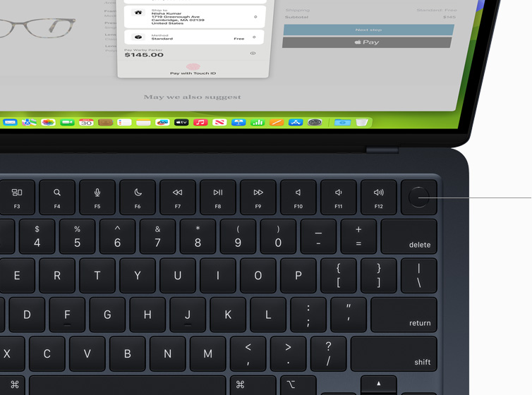 Top view of MacBook Air showcasing Touch ID and Magic Keyboard working with 戦国 カグラ スロット Pay.