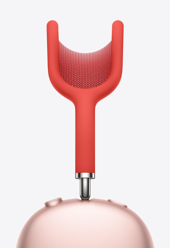 Mesh of canopy taut between curved Y-shaped canopy, flowing into a stemmed arm that connects to the ear cups of AirPods Max in Pink.